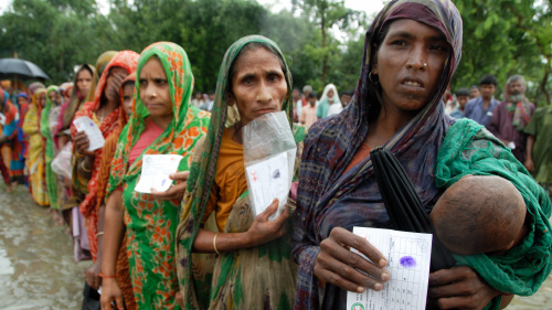 Women waiting in a line.